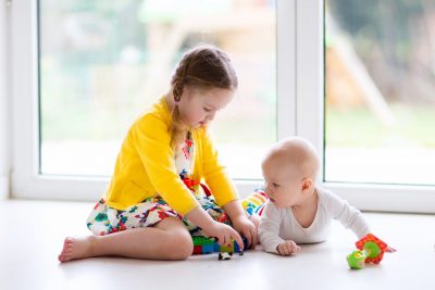 tummy time siblings